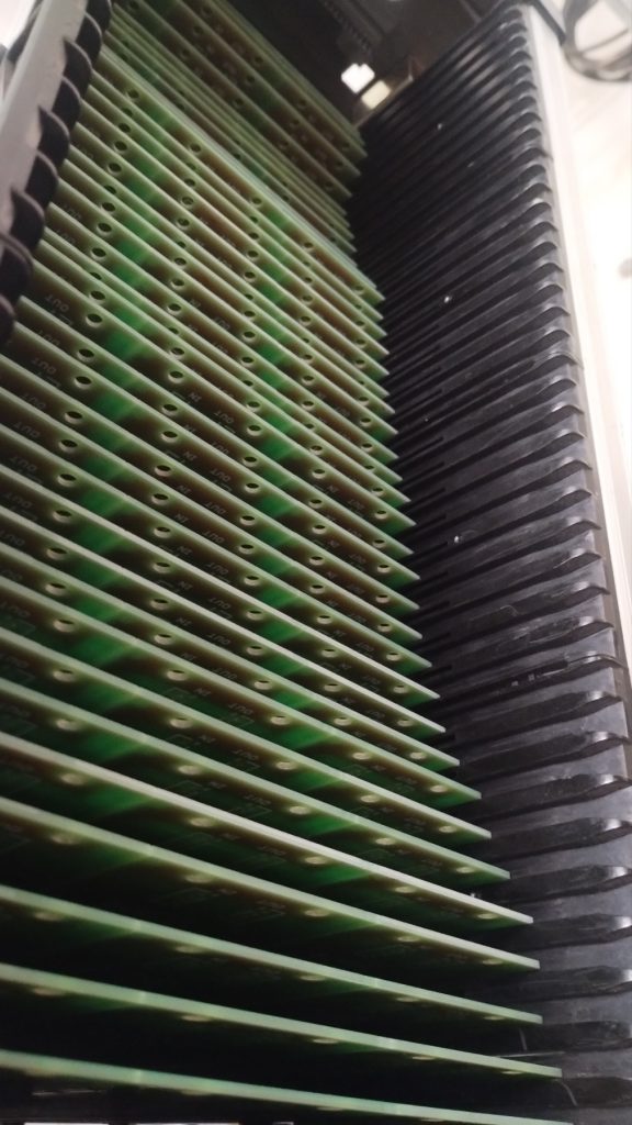 Assembled boards in an ESD magazine rack