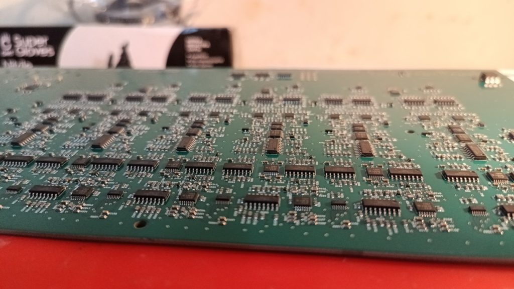 Assembled SMT PCB panel on a pick-and-place line