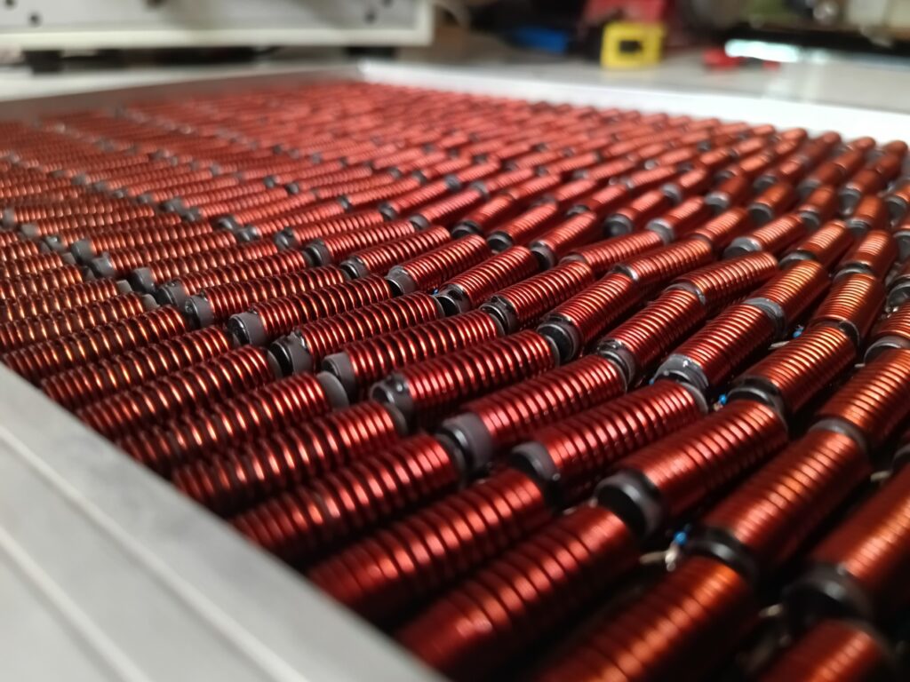 Ferrite chokes wound in batch